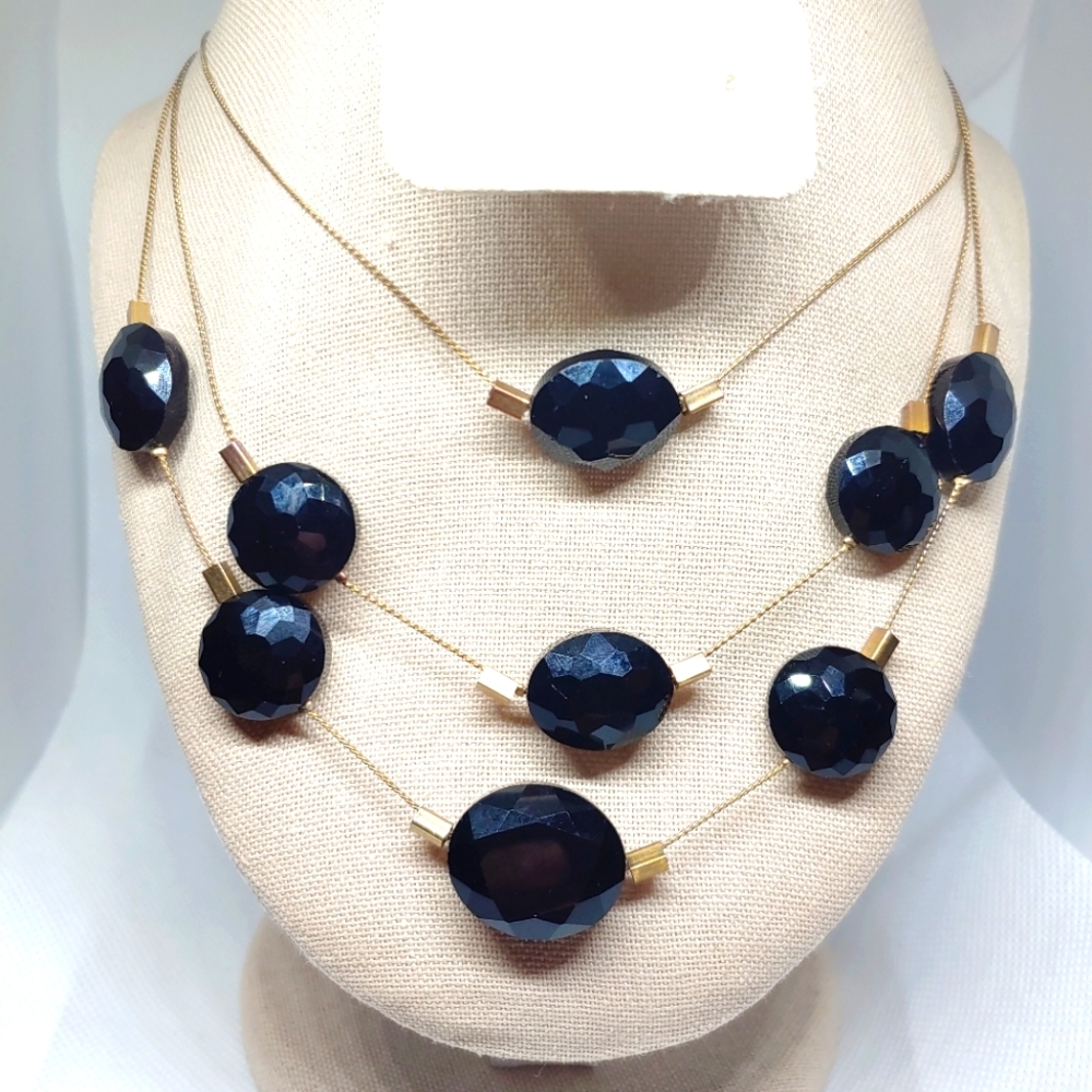 Kenneth Cole multistrand black jewel and goldtone necklace